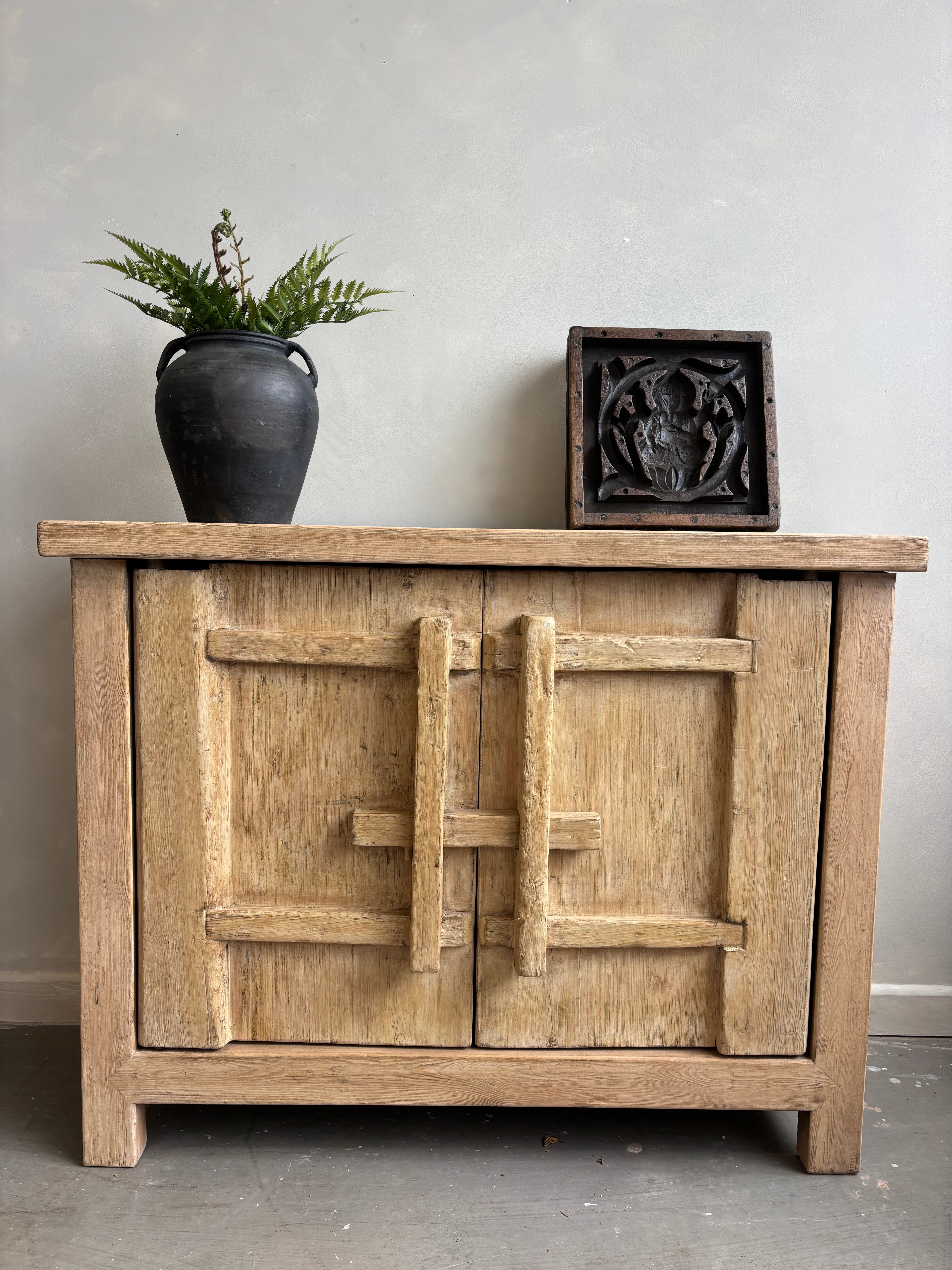 Two Door Elm Cabinet with Unique Doors