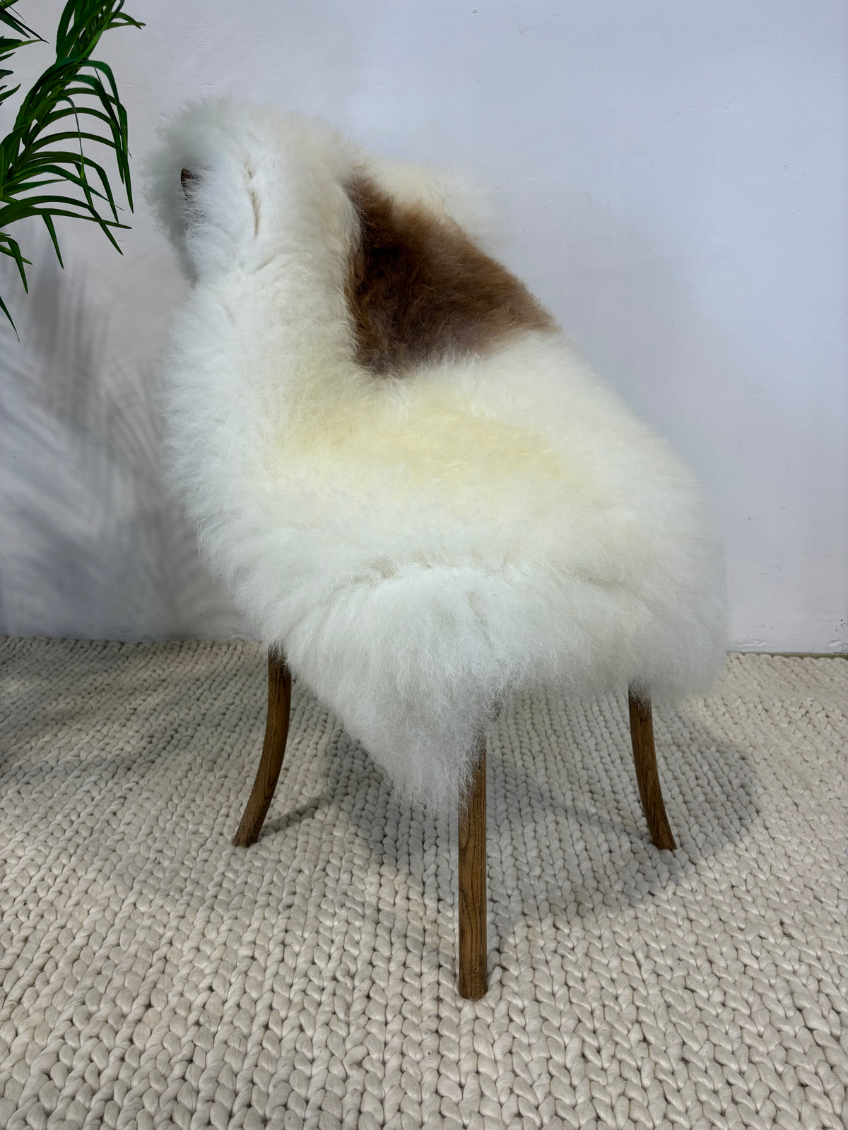 British Rare Breed Sheepskin, natural white with large dark spot