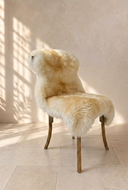 Caramel-tipped sheepskin over a chair