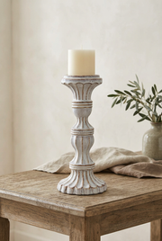 Society House lifestyle image featuring the aged white ceramic candle holder